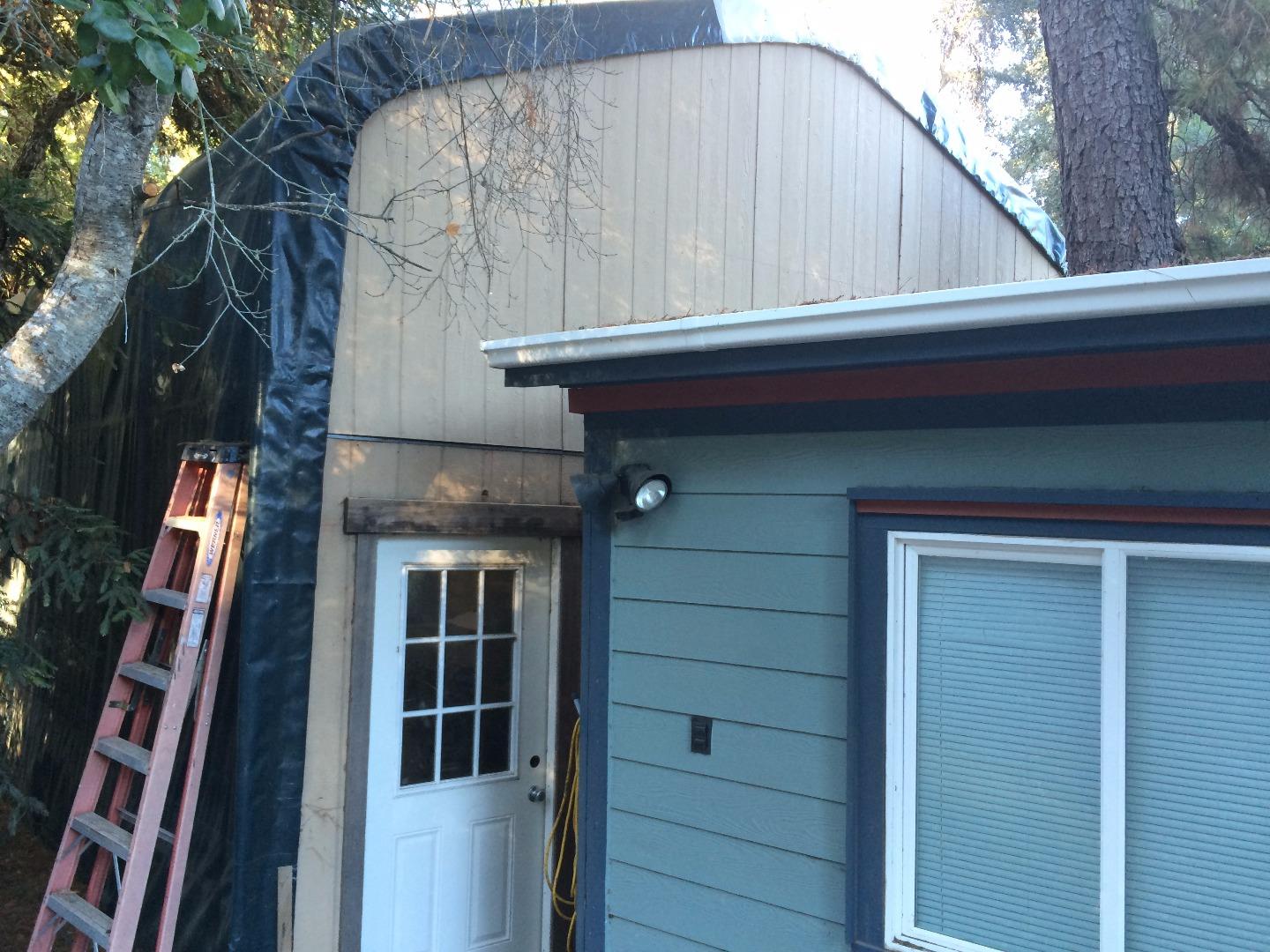 Sugarloaf Road Scotts Valley, CA 95066 - Photo 29 of 38 a front view of a house with a tree