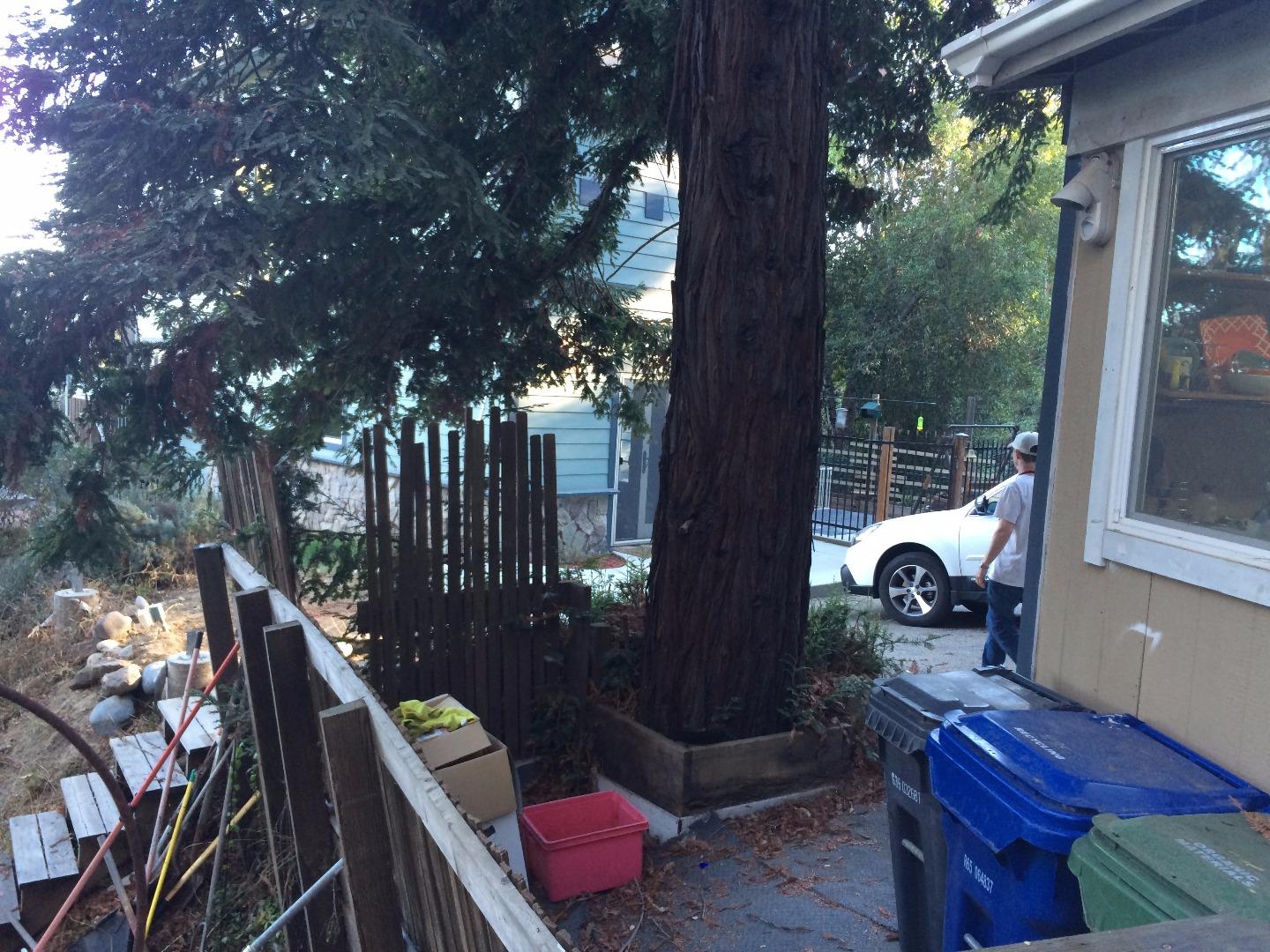 Sugarloaf Road Scotts Valley, CA 95066 - Photo 32 of 38 a backyard of a house with table and chairs