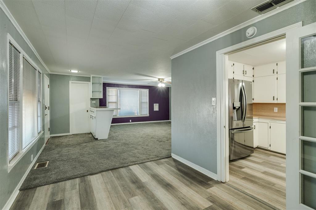 400 South Bailey Street Electra, TX 76360 - Photo 8 of 36 a view of a kitchen with a sink