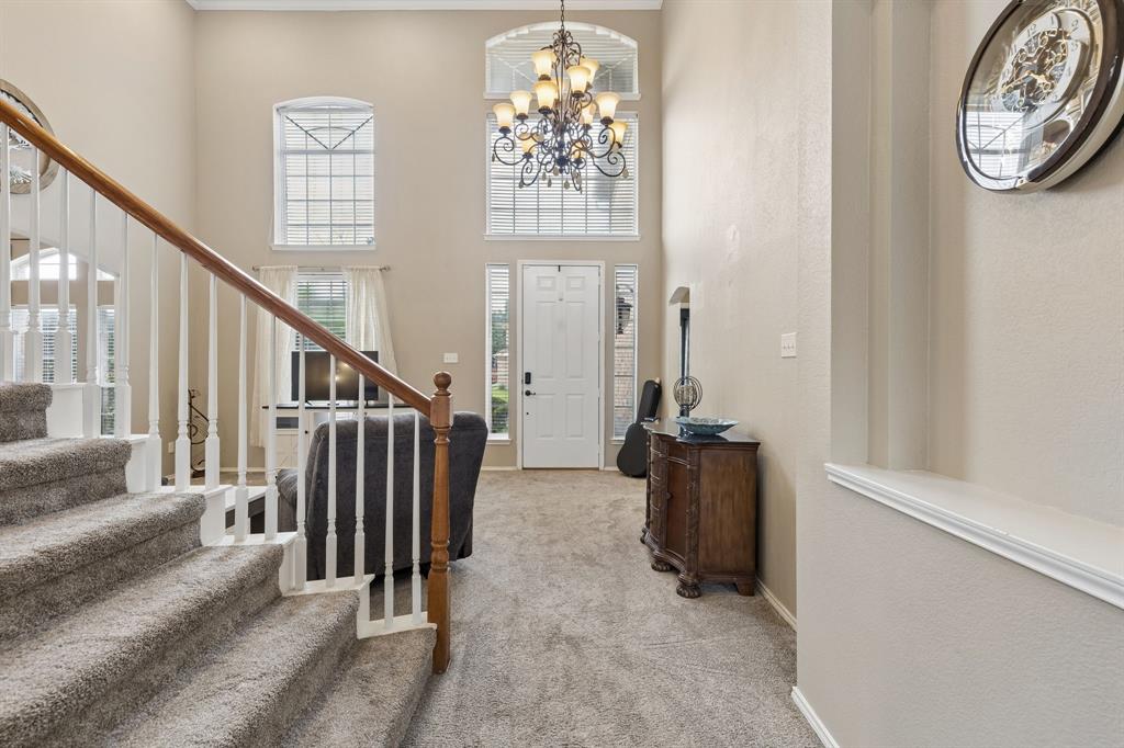 129 Timberbluff Lane Murphy, TX 75094 - Photo 6 of 34 a view of a hallway with windows