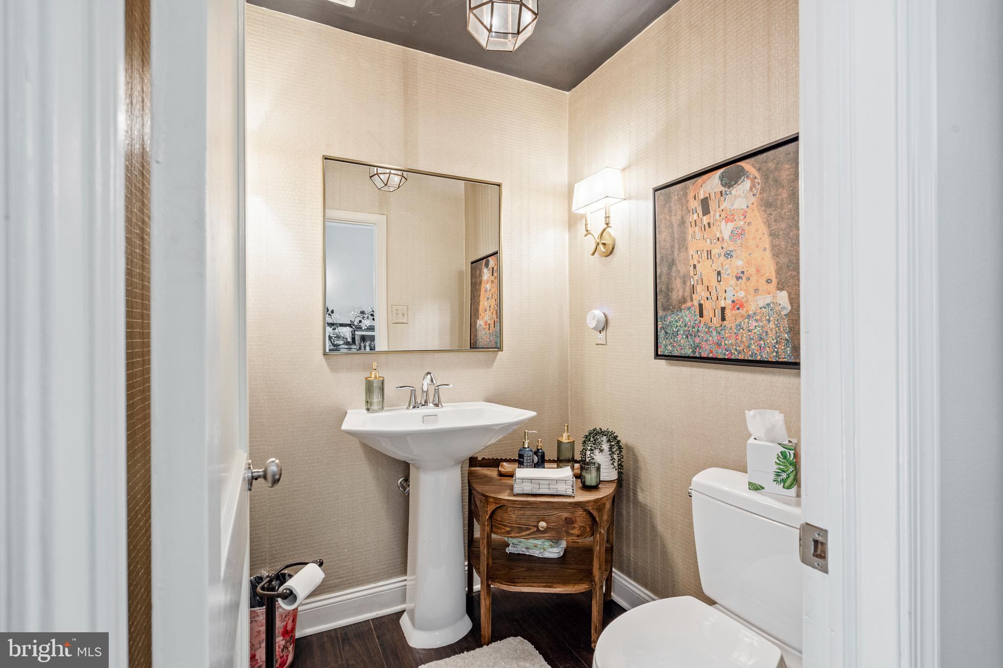 1179 Lafayette Road Wayne, PA 19087 - Photo 13 of 67 a bathroom with a toilet a sink and mirror