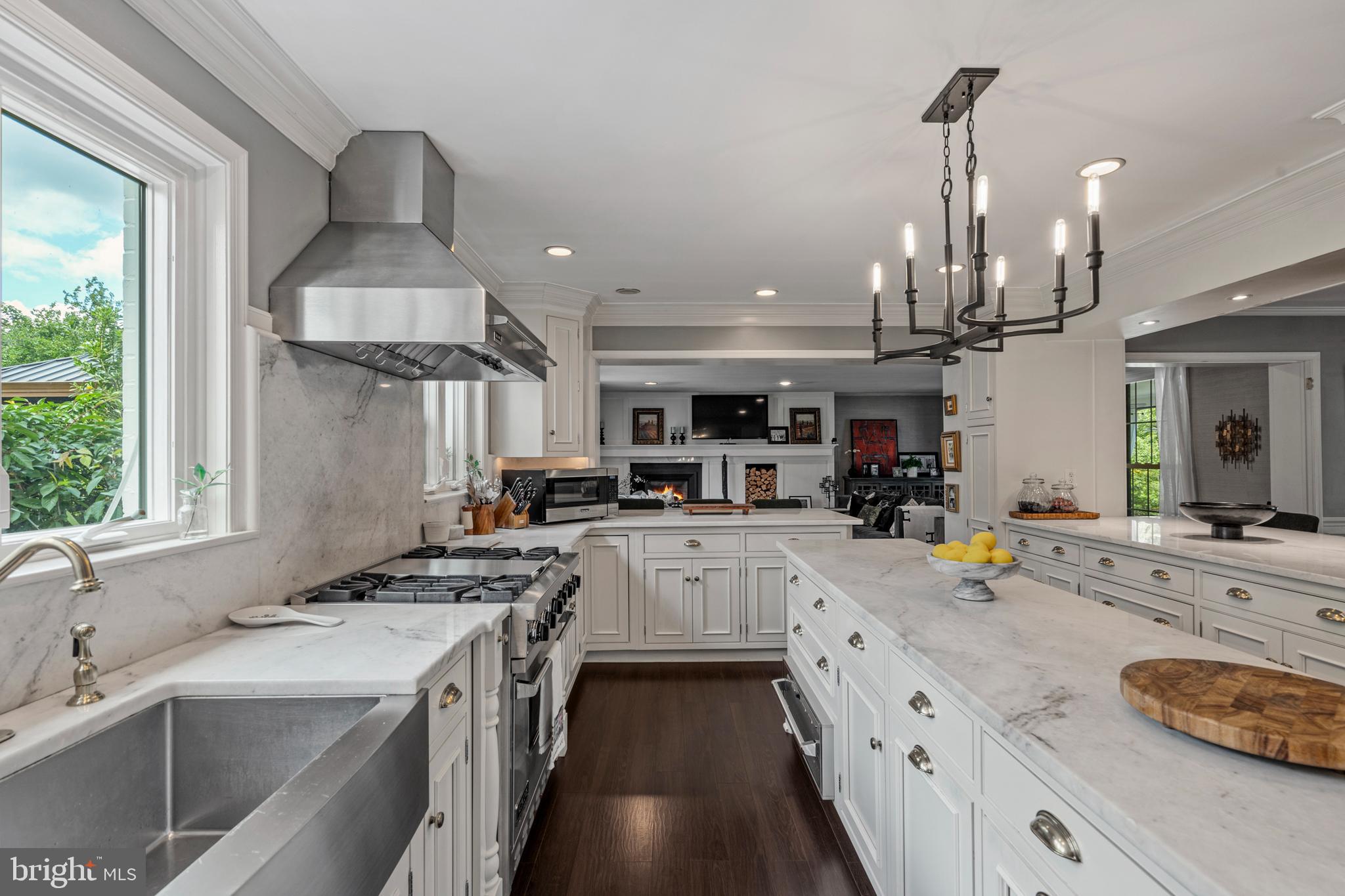 1179 Lafayette Road Wayne, PA 19087 - Photo 15 of 67 a kitchen with stainless steel appliances granite countertop a sink a stove and a wooden floors