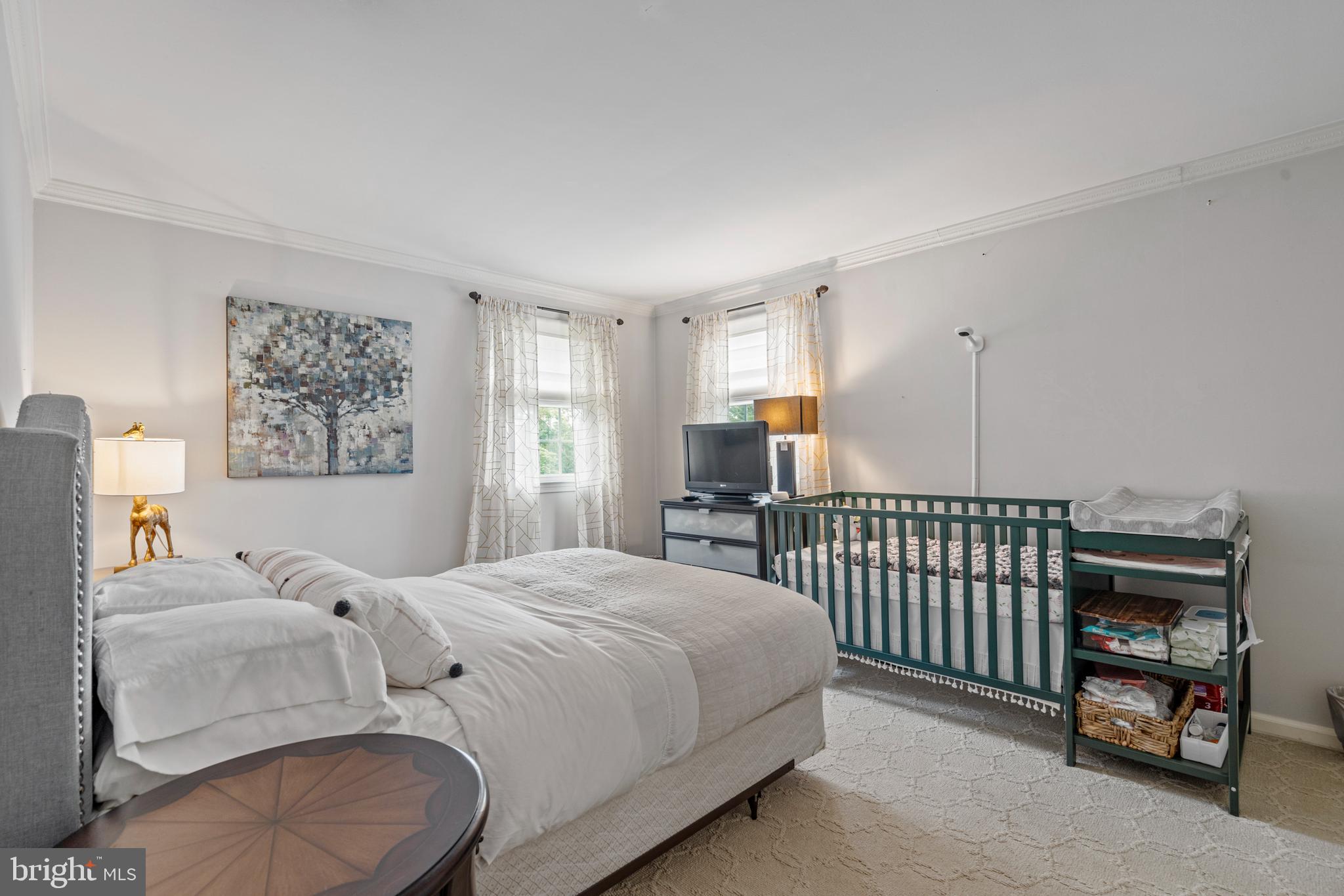 1179 Lafayette Road Wayne, PA 19087 - Photo 32 of 67 a bedroom with a bed and a window