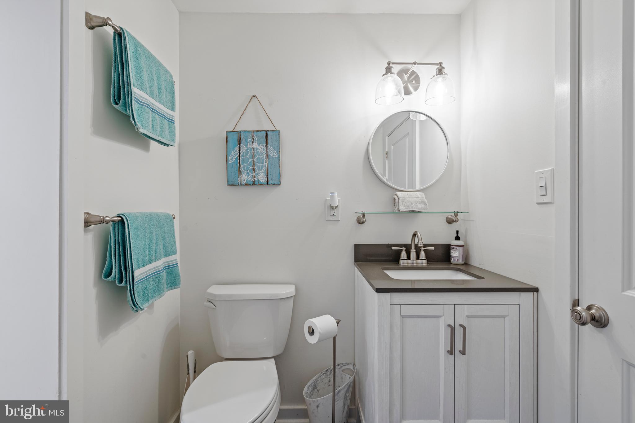 1179 Lafayette Road Wayne, PA 19087 - Photo 46 of 67 a bathroom with a toilet a sink and mirror