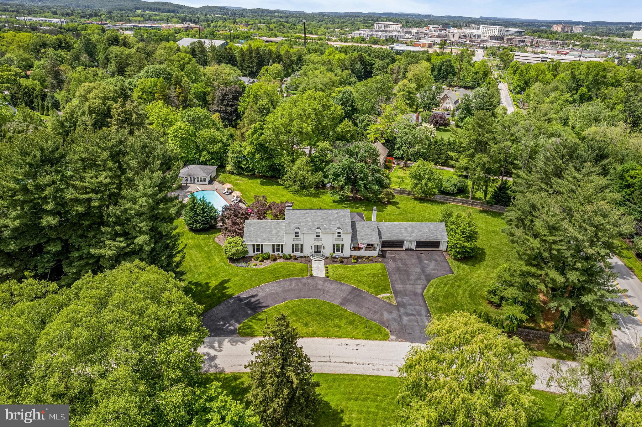 1179 Lafayette Road Wayne, PA 19087 - Photo 65 of 67 an aerial view of a house with yard swimming pool and outdoor seating