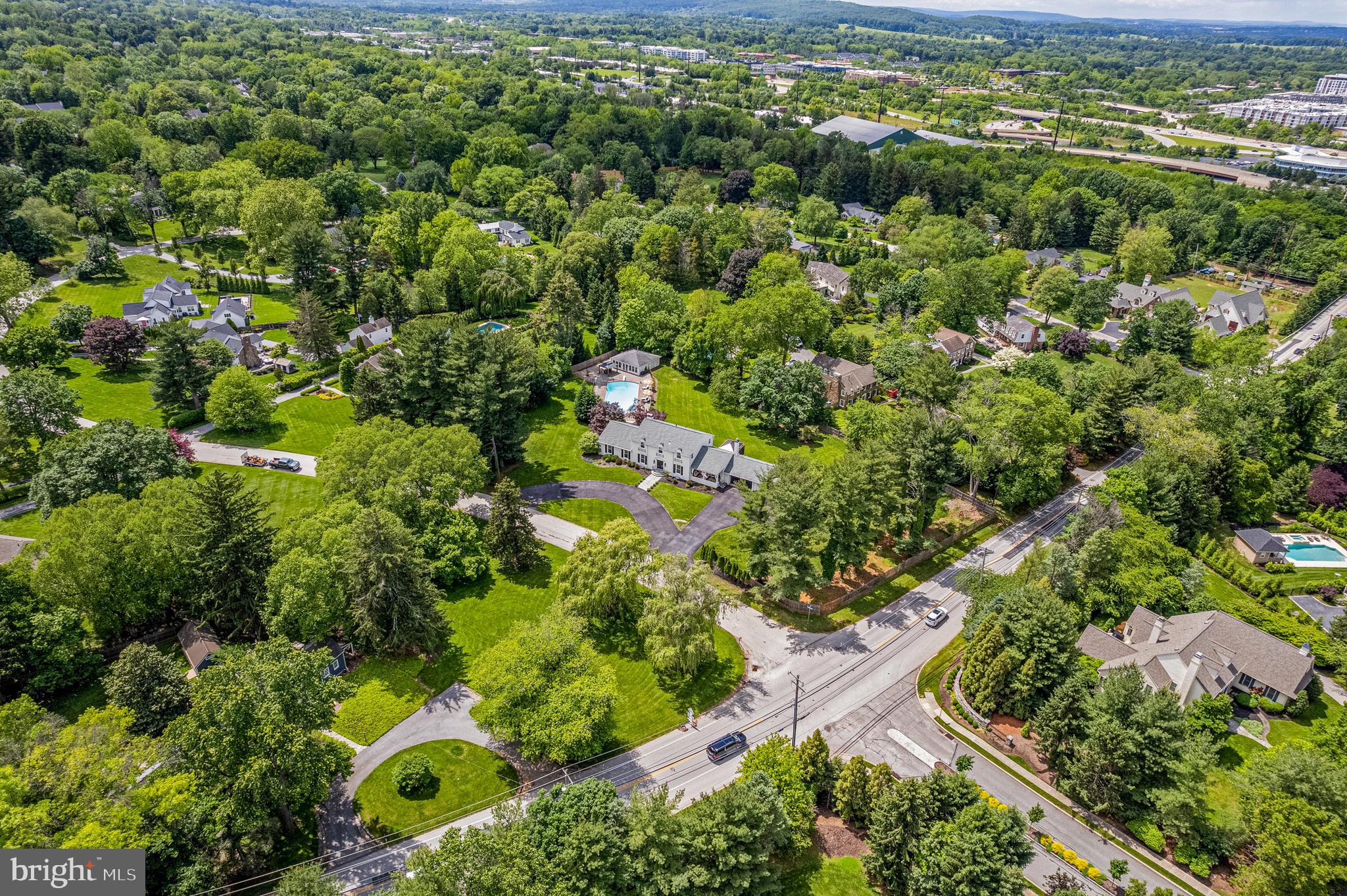 1179 Lafayette Road Wayne, PA 19087 - Photo 66 of 67 an aerial view of residential houses with outdoor space and trees
