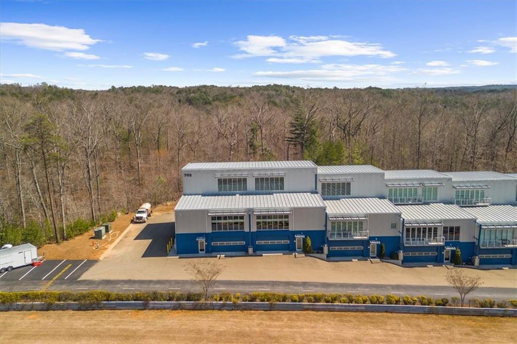 702 Joe Lane Cox Road, Unit 101 & 201 Dawsonville, GA 30534 - Photo 2 of 37 a aerial view of a house with roof deck