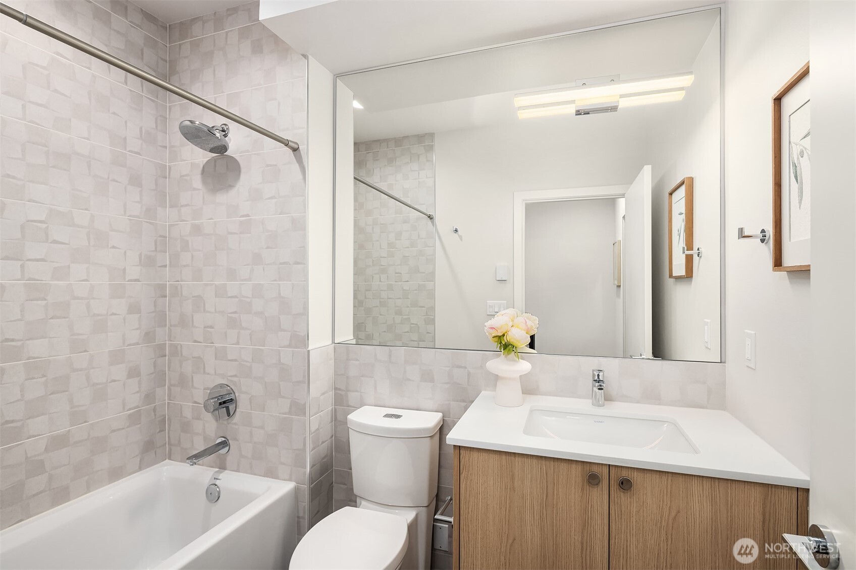 17342 Bothell Way Northeast, Unit H Bothell, WA 98011 - Photo 17 of 39 a bathroom with a sink toilet vanity and shower