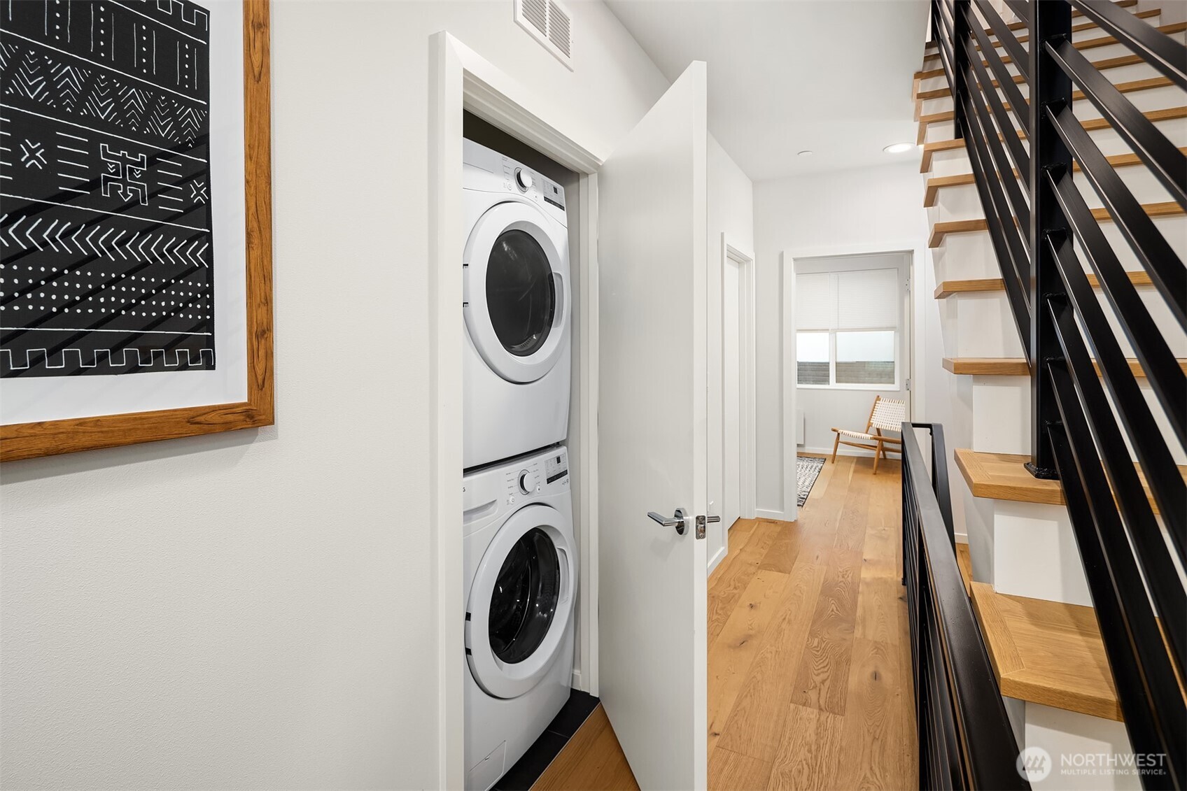 17342 Bothell Way Northeast, Unit H Bothell, WA 98011 - Photo 18 of 39 a view of a hallway with washer and dryer
