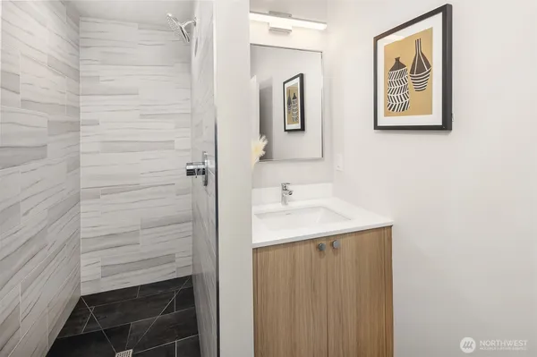 a bathroom with a sink and a mirror