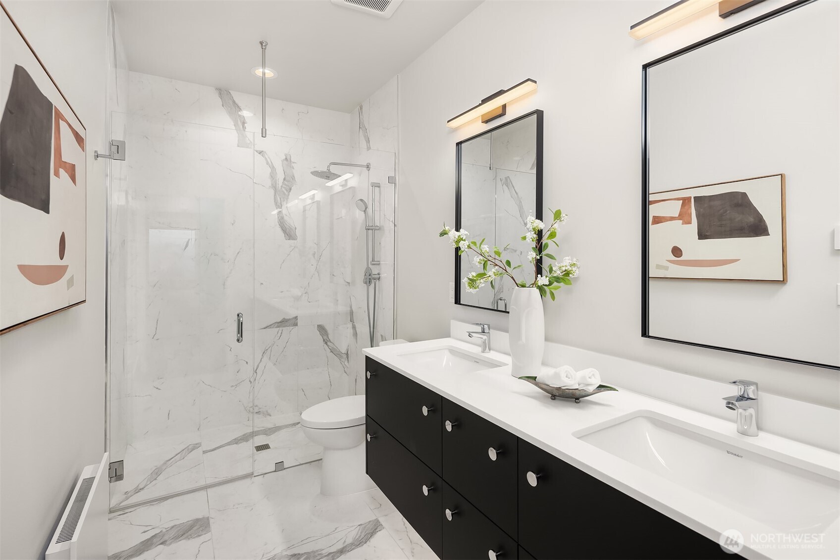 17342 Bothell Way Northeast, Unit H Bothell, WA 98011 - Photo 25 of 39 a bathroom with a double vanity sink toilet and shower