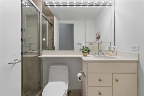 a bathroom with a sink and mirror