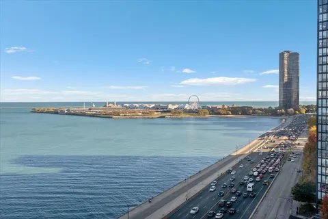 a view of a lake with a city view