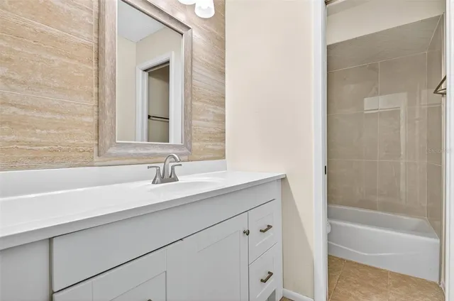 a potted plant sitting in front of a house