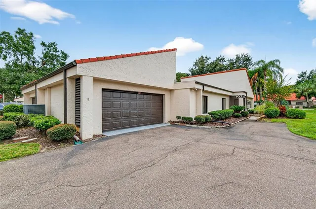 a view of yard with swimming pool and outdoor seating