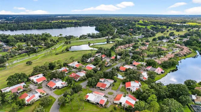 a view of a house with a big yard