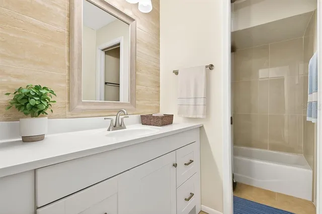 a bathroom with a sink and a bathtub