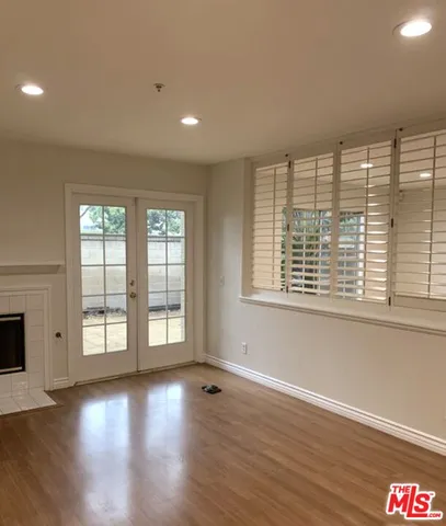 an empty room with closet area