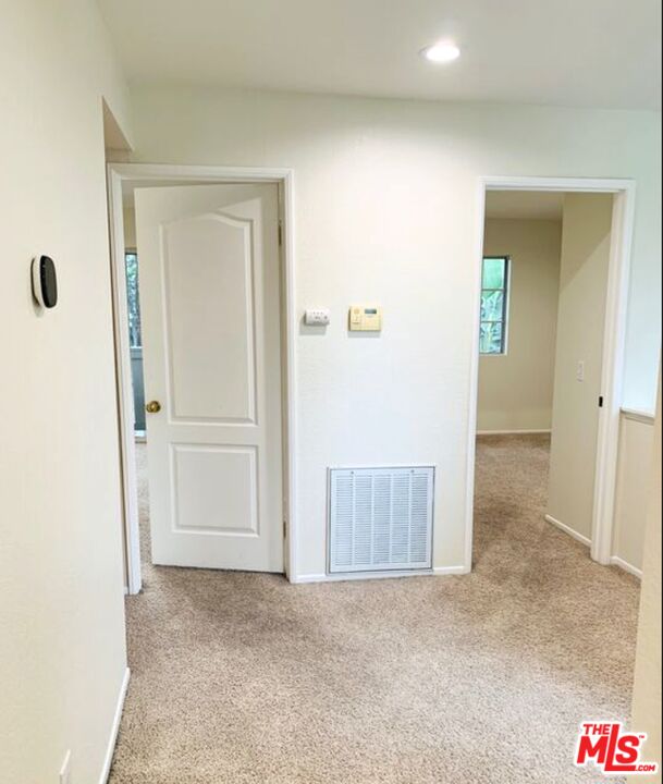 11209 Terra Vista Parkway, Unit C Rancho Cucamonga, CA 91730 - Photo 8 of 9 an empty room with closet area