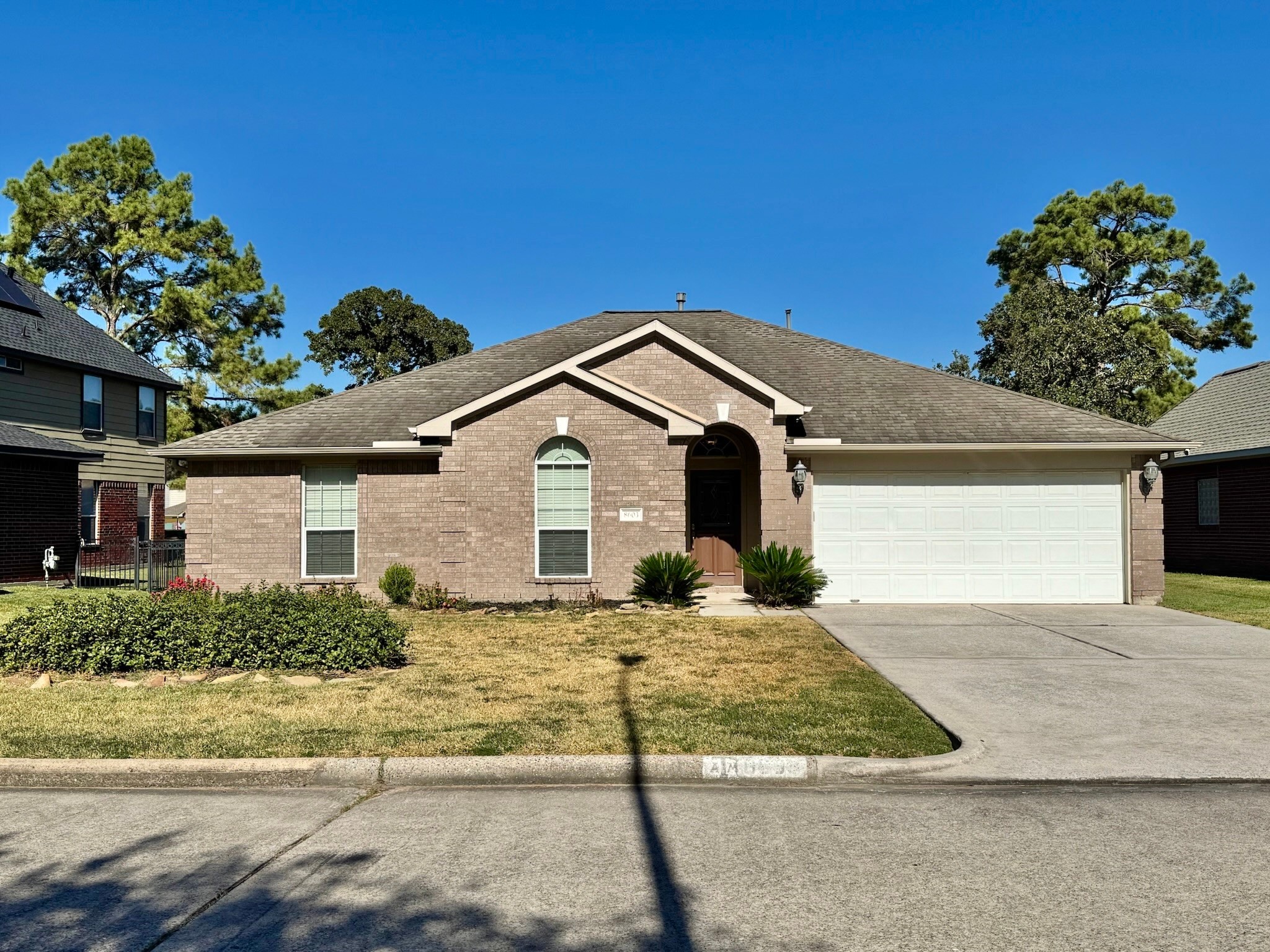 8603 Malardcrest Drive Humble, TX 77346 - Photo 2 of 21 a front view of a house with a yard