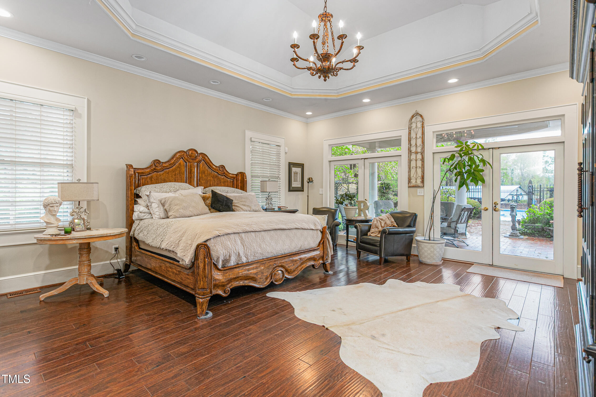 3542 Bason Road Mebane, NC 27302 - Photo 17 of 39 a bedroom with a bed and a large window