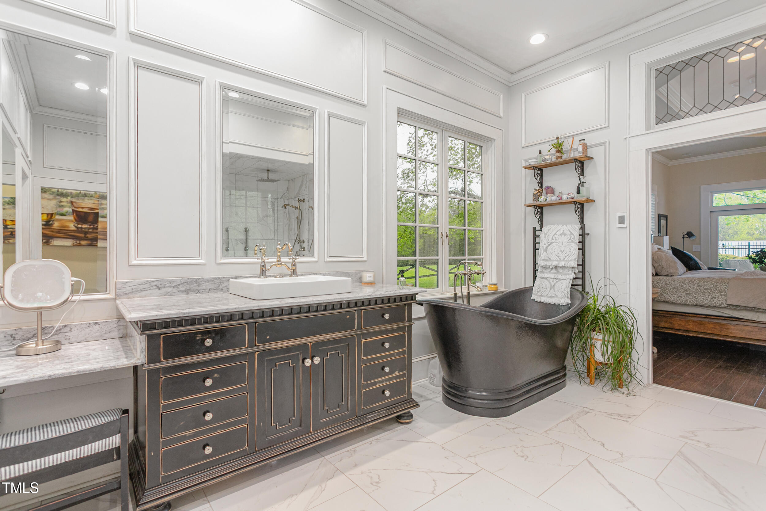 3542 Bason Road Mebane, NC 27302 - Photo 19 of 39 a spacious bathroom with a granite countertop tub double vanity and a sink