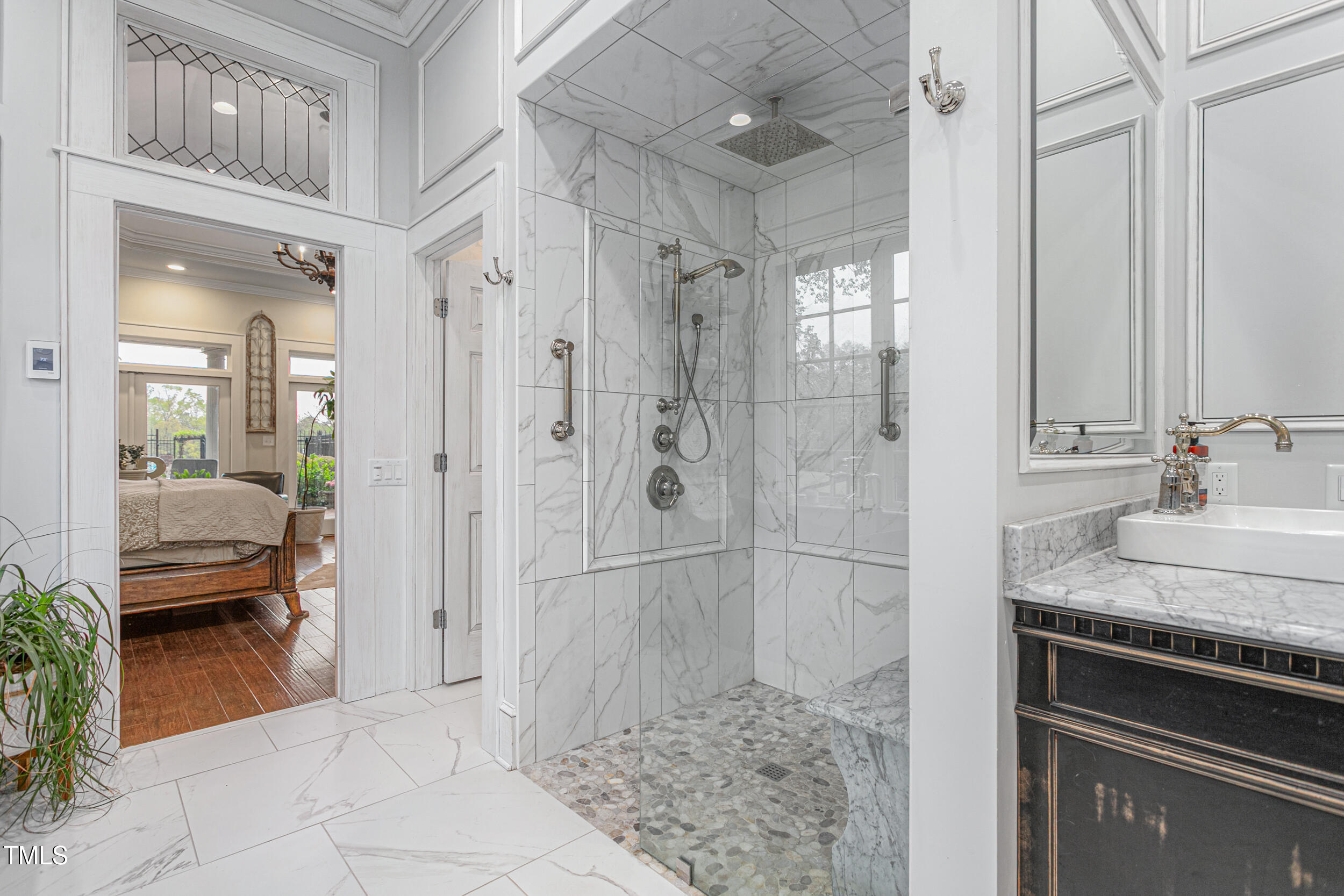 3542 Bason Road Mebane, NC 27302 - Photo 20 of 39 a bathroom with a granite countertop sink a mirror and shower