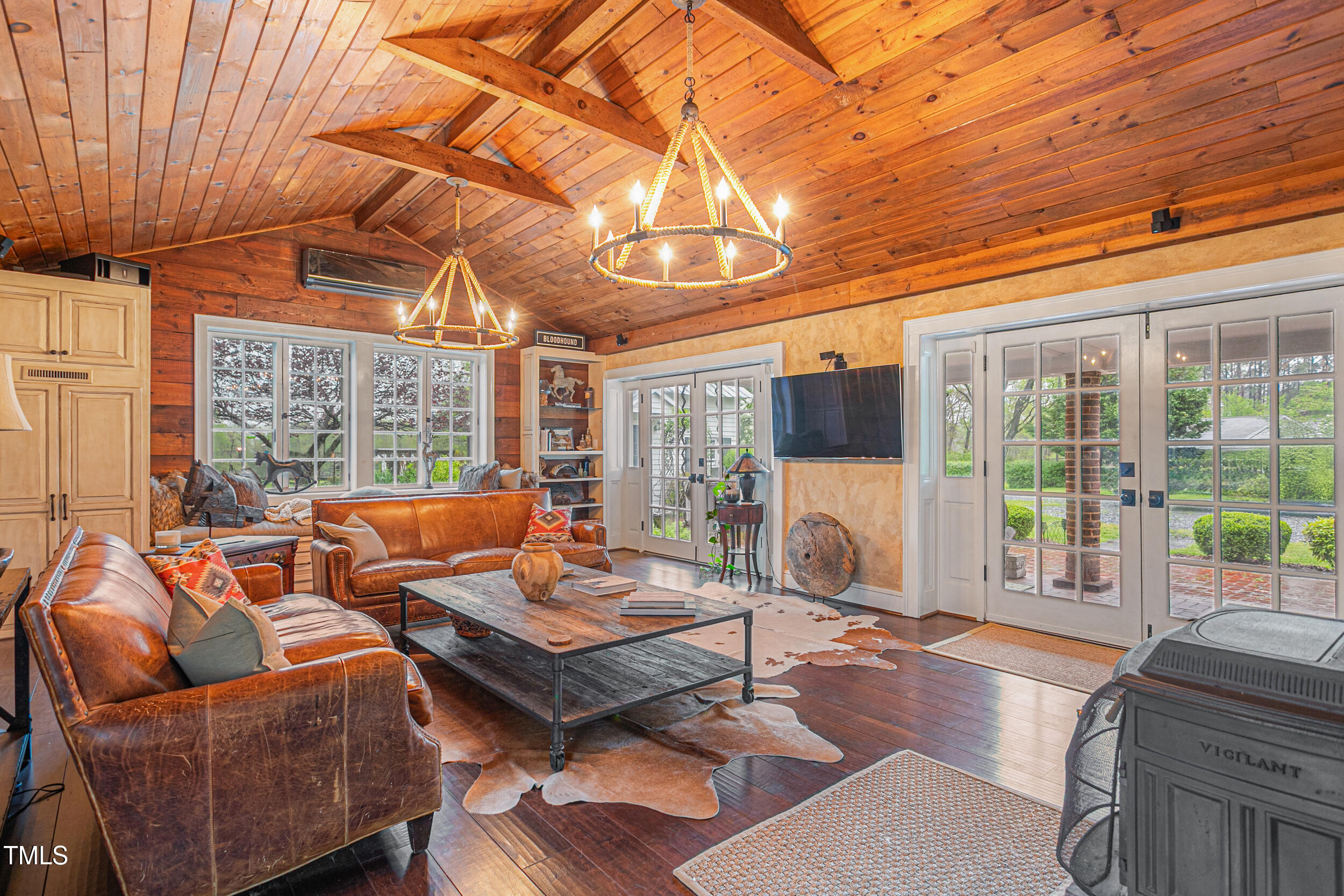 3542 Bason Road Mebane, NC 27302 - Photo 22 of 39 a living room with furniture a large window with outer view