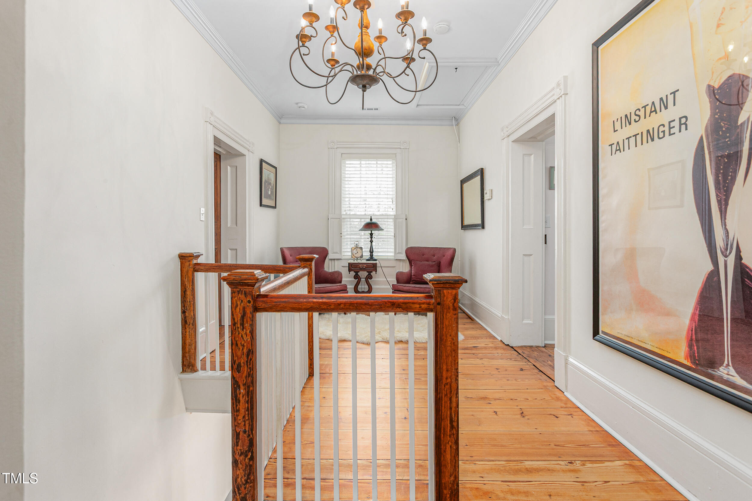 3542 Bason Road Mebane, NC 27302 - Photo 28 of 39 a view of a hallway with furniture and chandelier