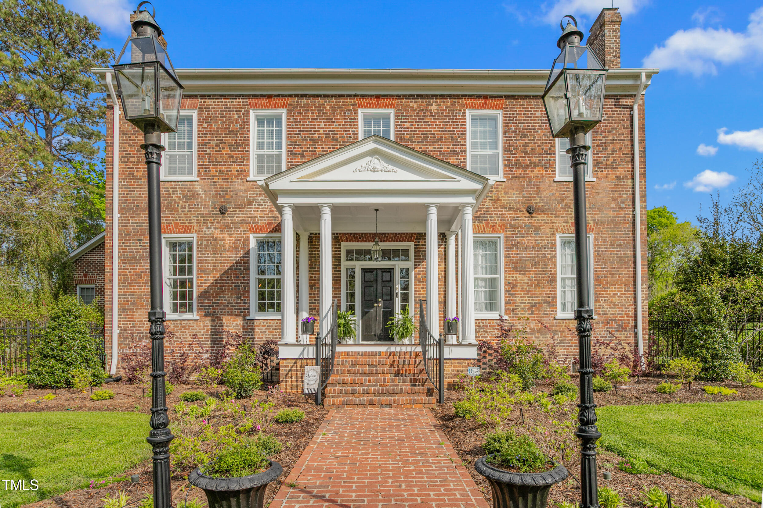 3542 Bason Road Mebane, NC 27302 - Photo 3 of 39 a front view of a house with garden