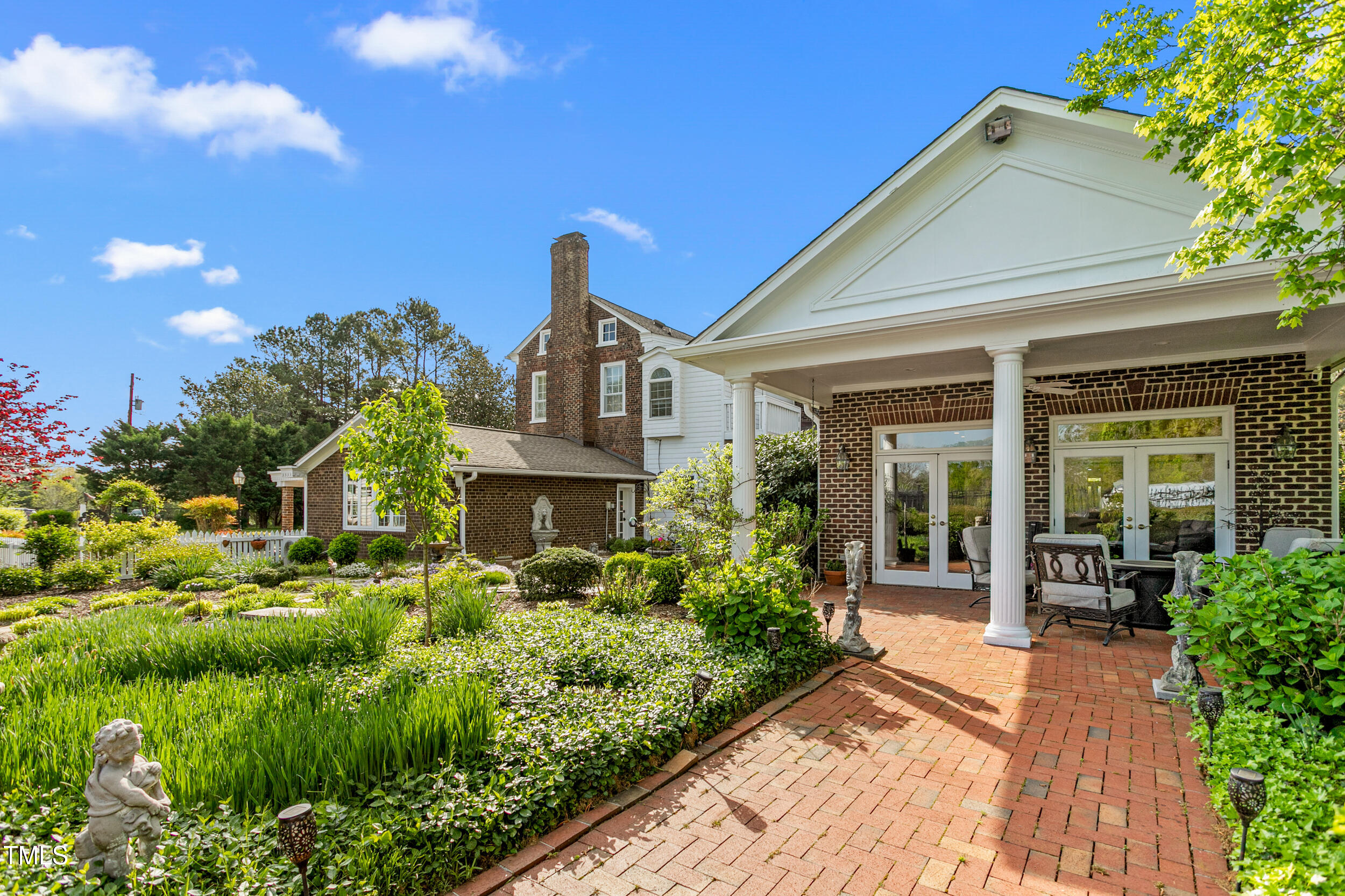 3542 Bason Road Mebane, NC 27302 - Photo 5 of 39 a front view of a house with a yard