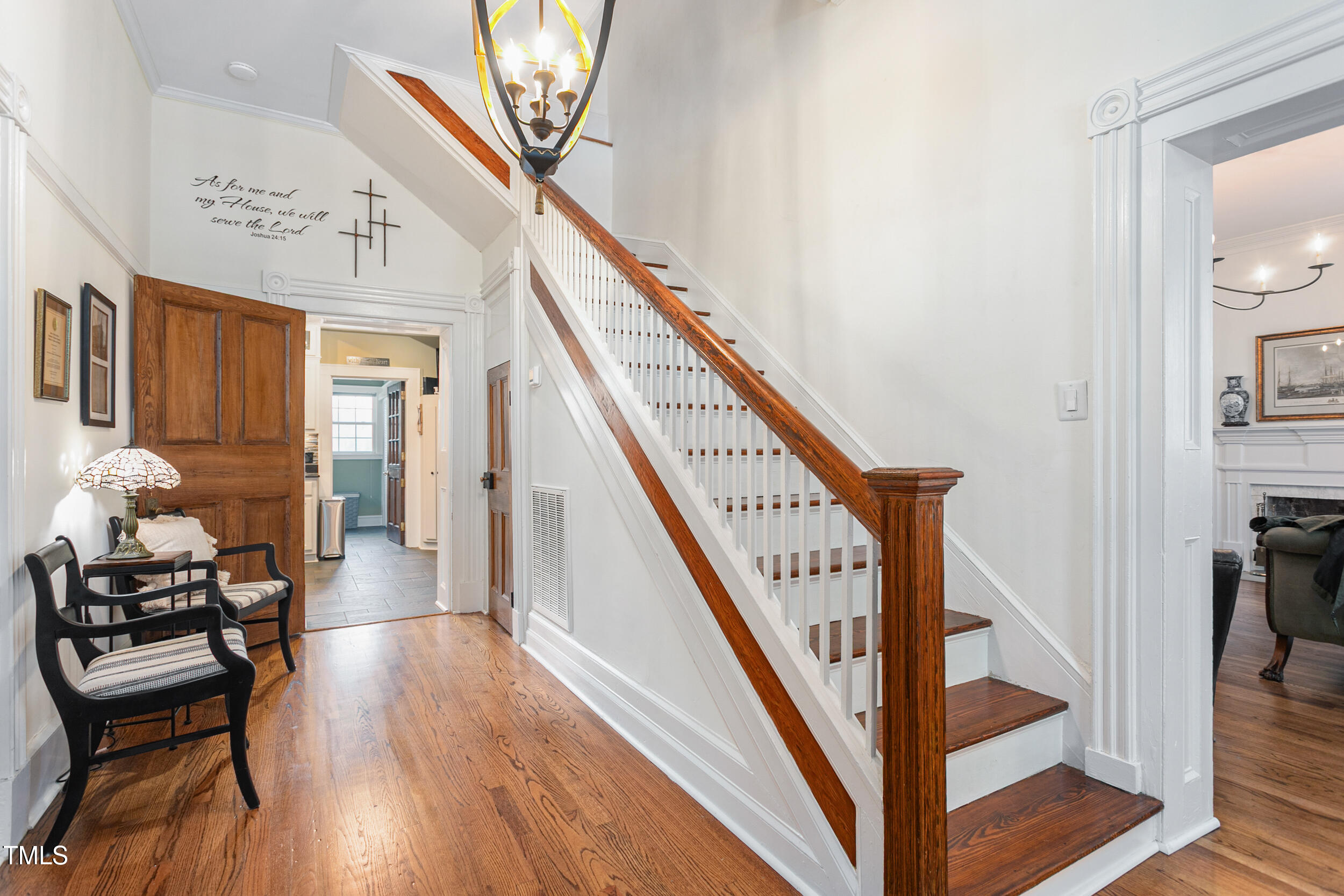 3542 Bason Road Mebane, NC 27302 - Photo 7 of 39 a hallway with wooden floor and furniture