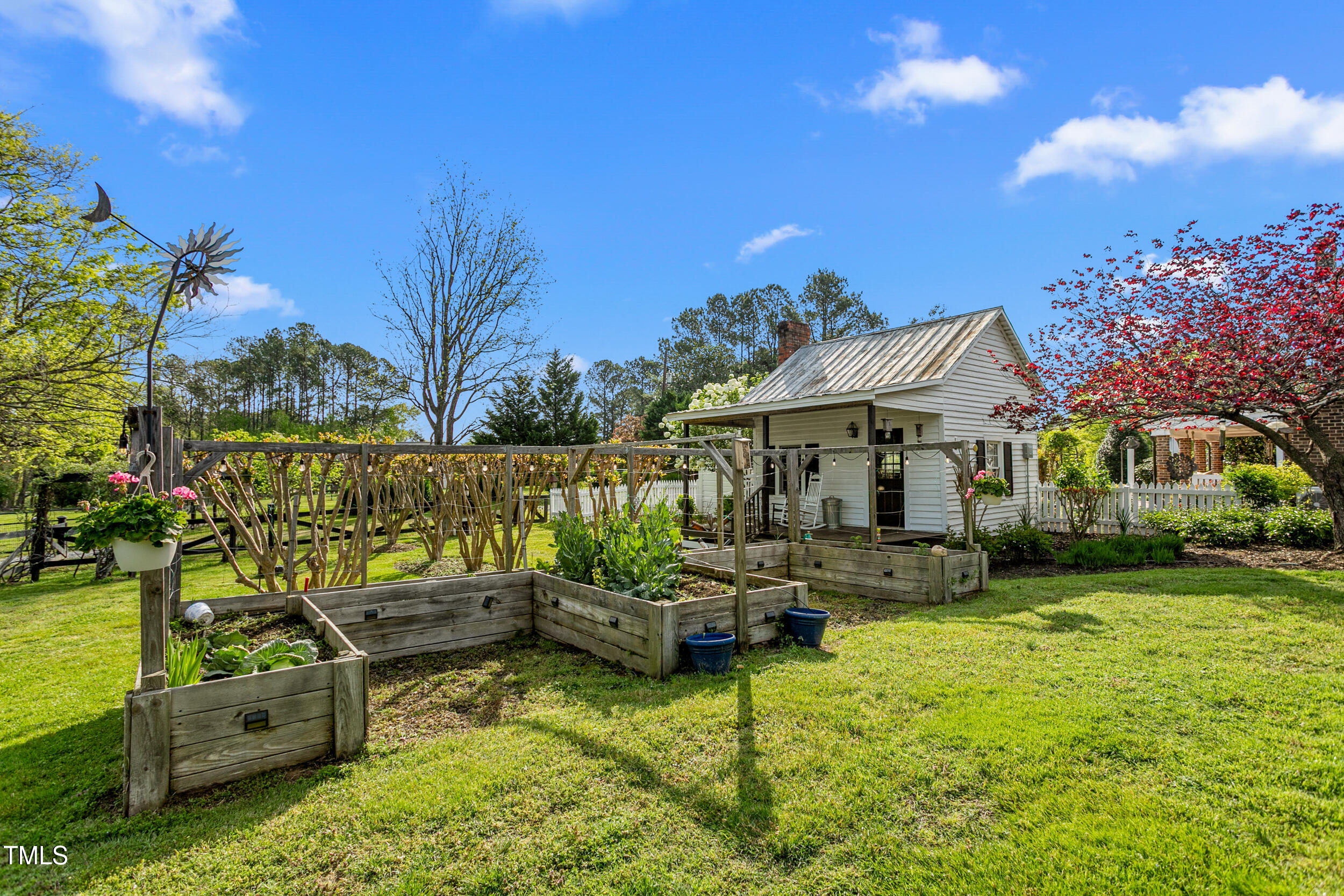 3542 Bason Road Mebane, NC 27302 - Photo 9 of 39 a view of a house with backyard outdoor seating and hardwood