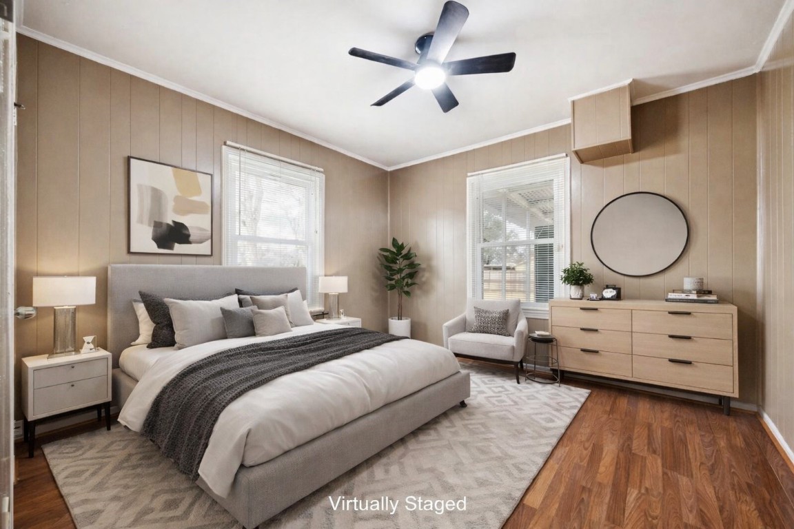 12537 Terrance Street Houston, TX 77085 - Photo 12 of 27 This room with soft neutral paint, two large bedroom windows and a modern ceiling fan is the perfect place to start and end your day. Virtually Staged bedroom.