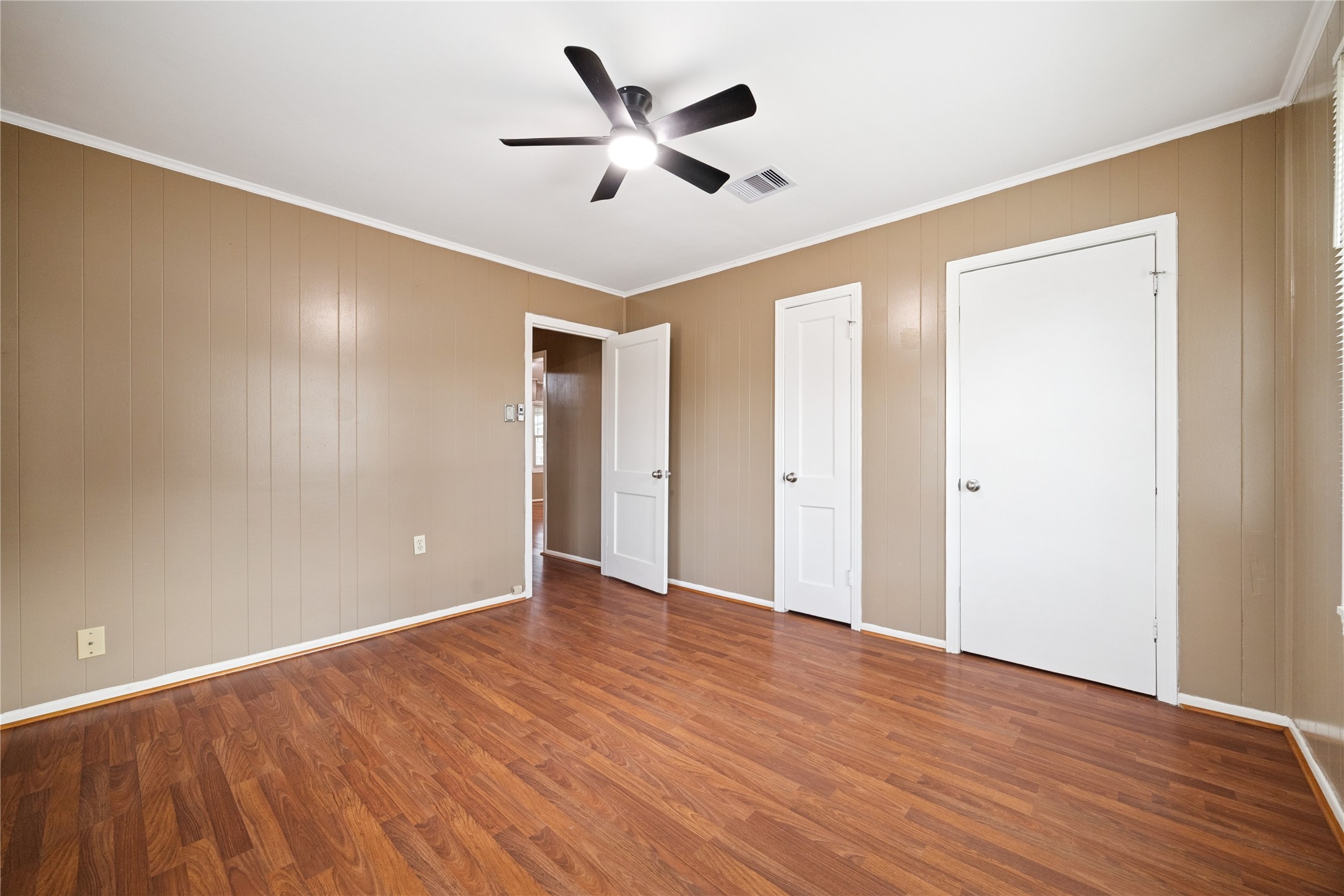 12537 Terrance Street Houston, TX 77085 - Photo 15 of 27 a view of an empty room with wooden floor
