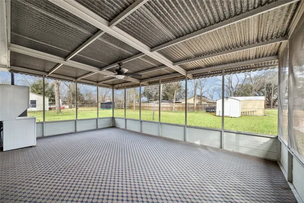 a view of a backyard of the house