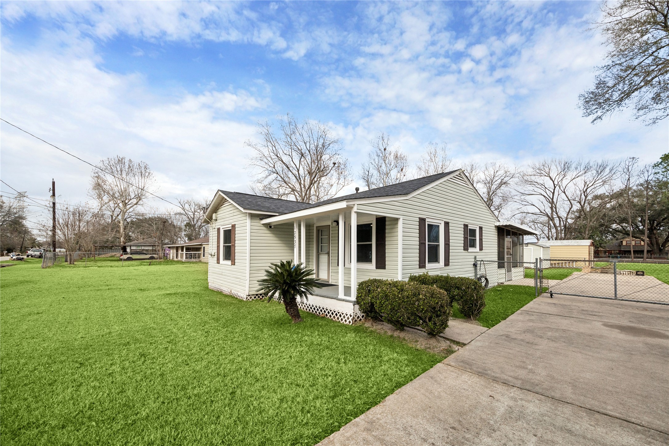 12537 Terrance Street Houston, TX 77085 - Photo 2 of 27 a front view of a house with a garden