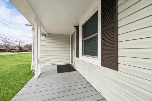 a view of a backyard of the house