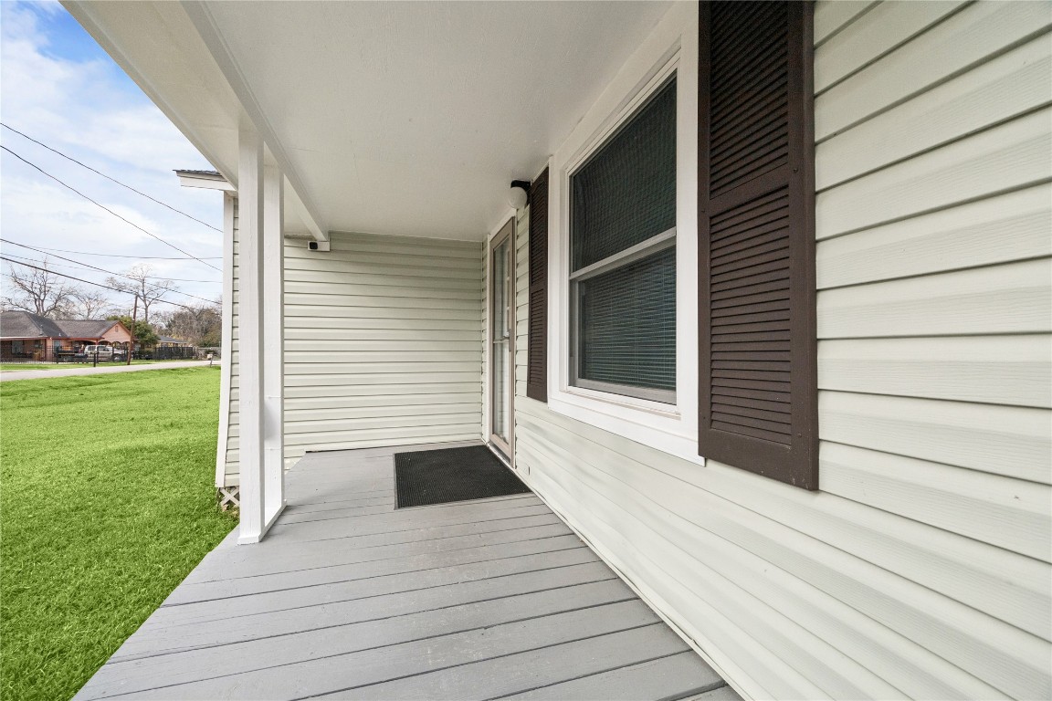 12537 Terrance Street Houston, TX 77085 - Photo 4 of 27 Picture yourself relaxing on this covered front porch looking out to the spacious yard.