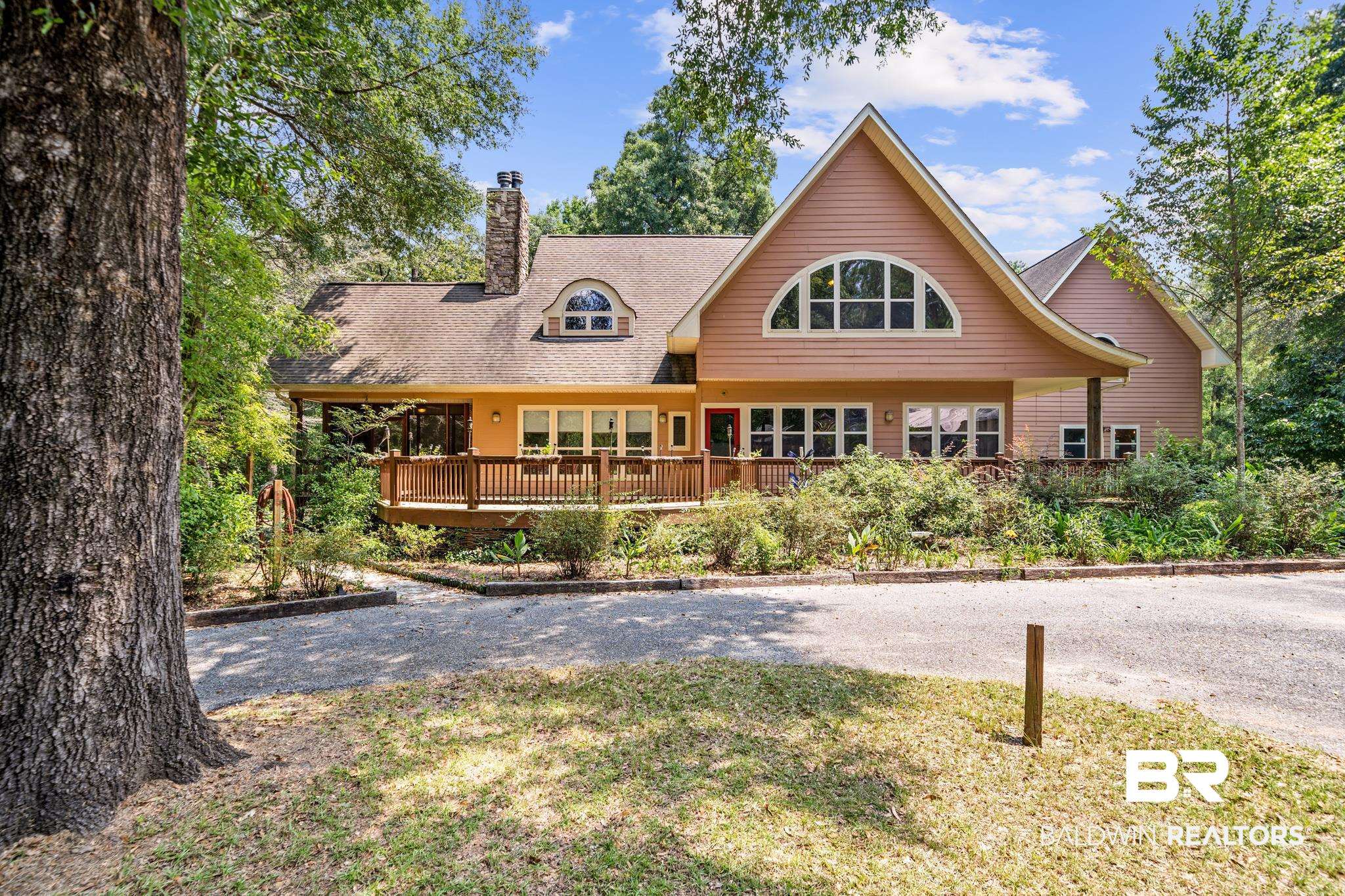 8321 Dixon Road Bay Minette, AL 36507 - Photo 1 of 79 View of front facade featuring a wooden deck
