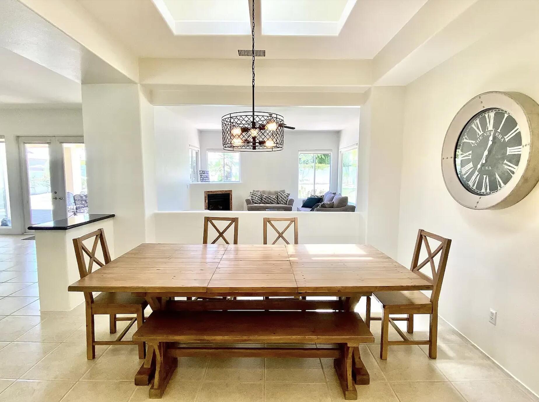 5 Victoria Falls Drive Rancho Mirage, CA 92270 - Photo 19 of 26 a dining room with a table and chairs