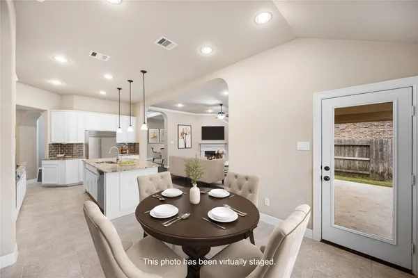 a bedroom with a bed and a table