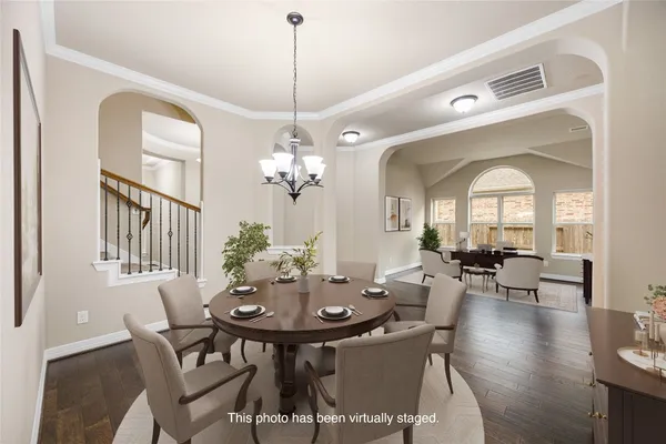 a spacious bathroom with a granite countertop tub sink and mirror