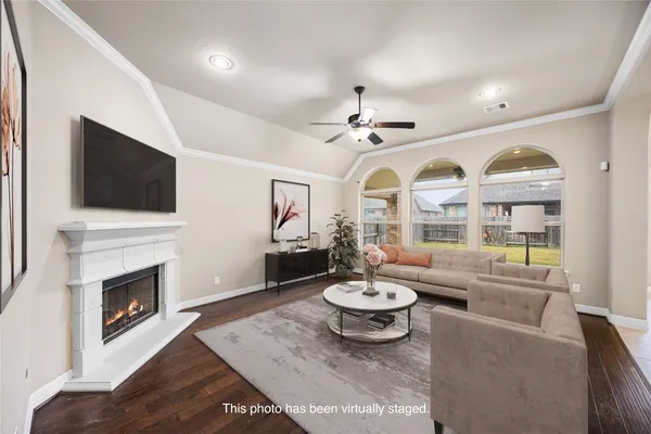 a large kitchen with granite countertop a stove and a sink