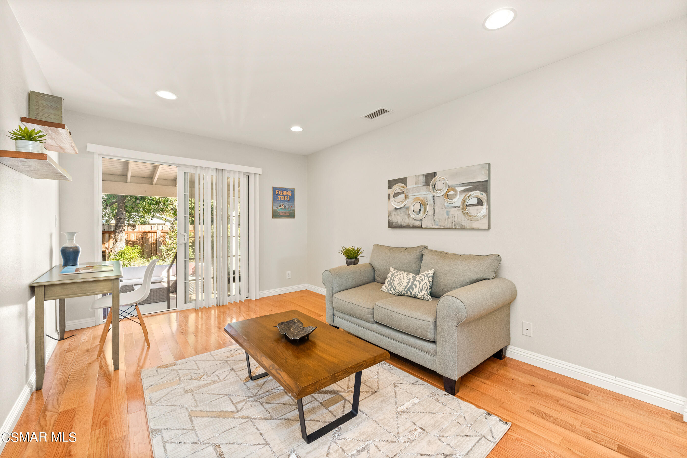 608 Hodencamp Road Thousand Oaks, CA 91360 - Photo 12 of 24 a living room with furniture and a table