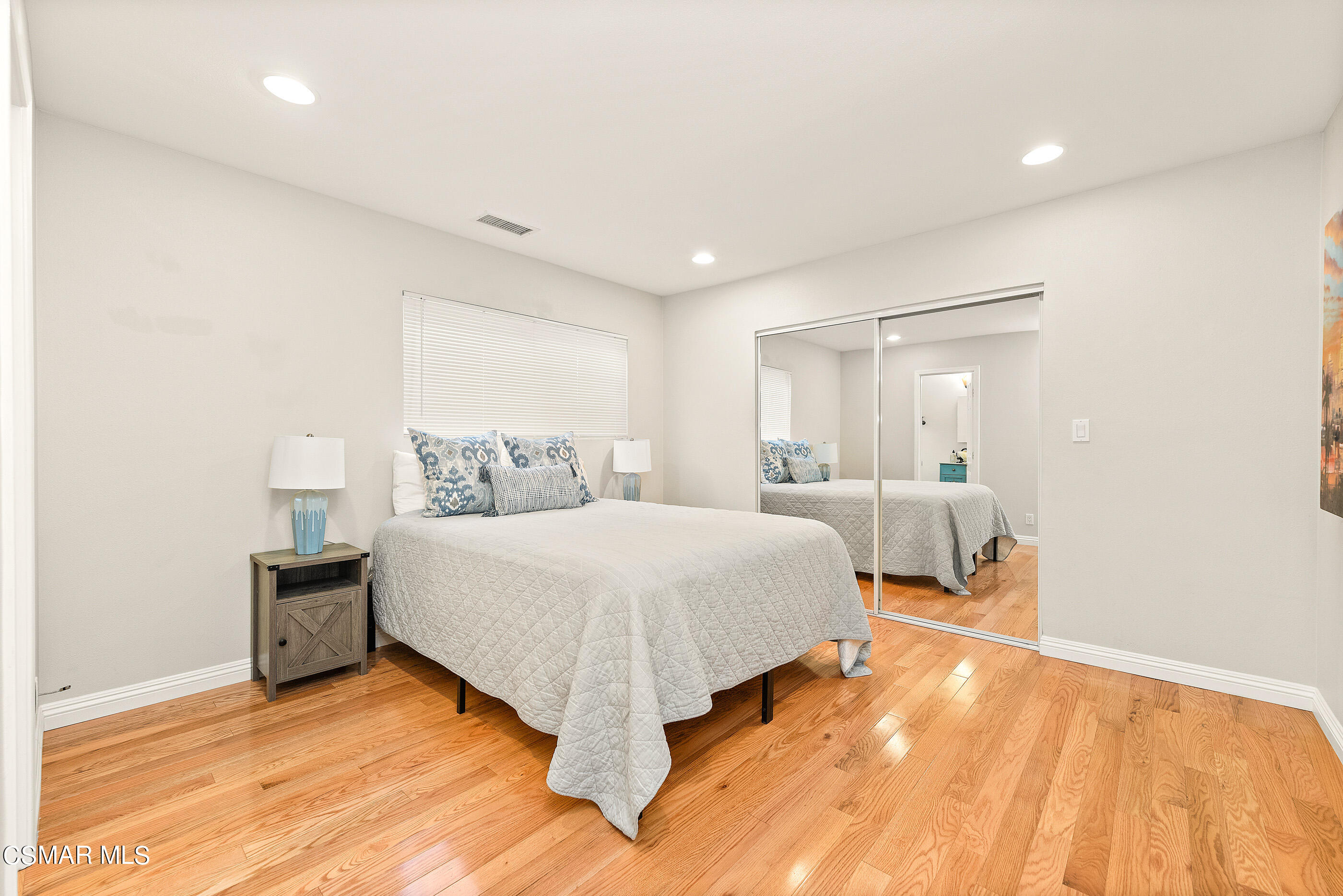 608 Hodencamp Road Thousand Oaks, CA 91360 - Photo 13 of 24 a spacious bedroom with a bed and a large window