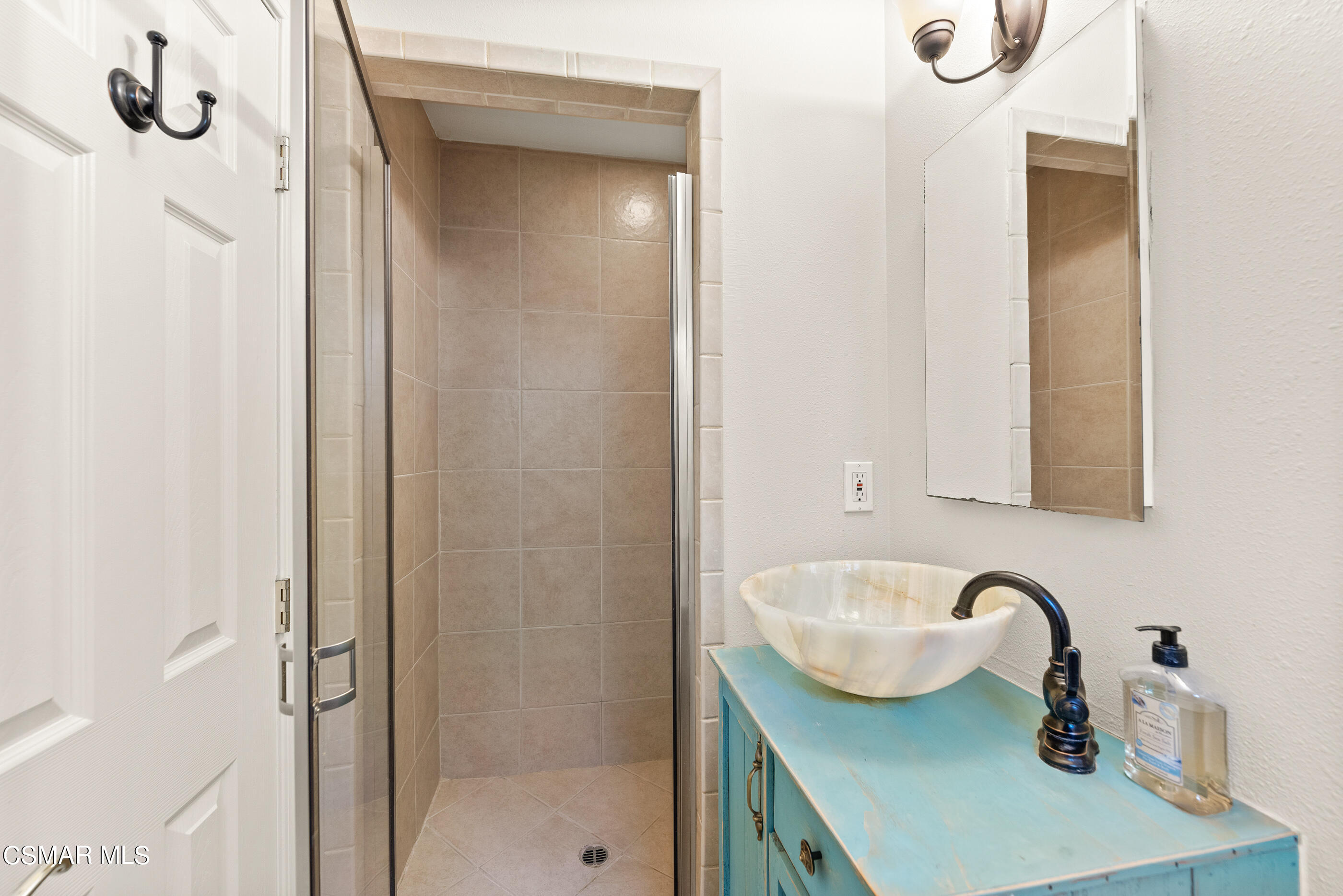 608 Hodencamp Road Thousand Oaks, CA 91360 - Photo 14 of 24 a bathroom with a sink a toilet and shower