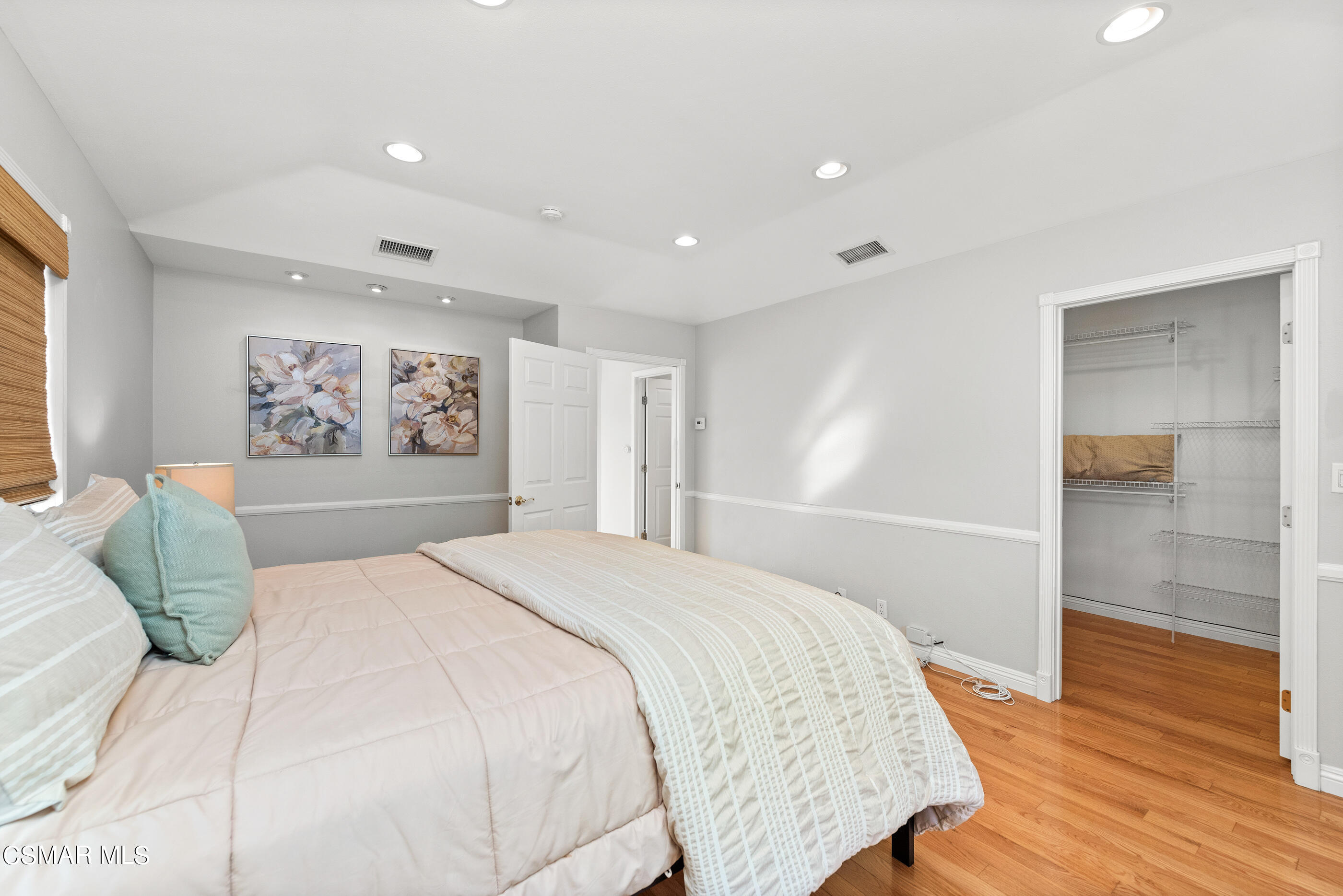 608 Hodencamp Road Thousand Oaks, CA 91360 - Photo 16 of 24 a bedroom with a large bed and a window