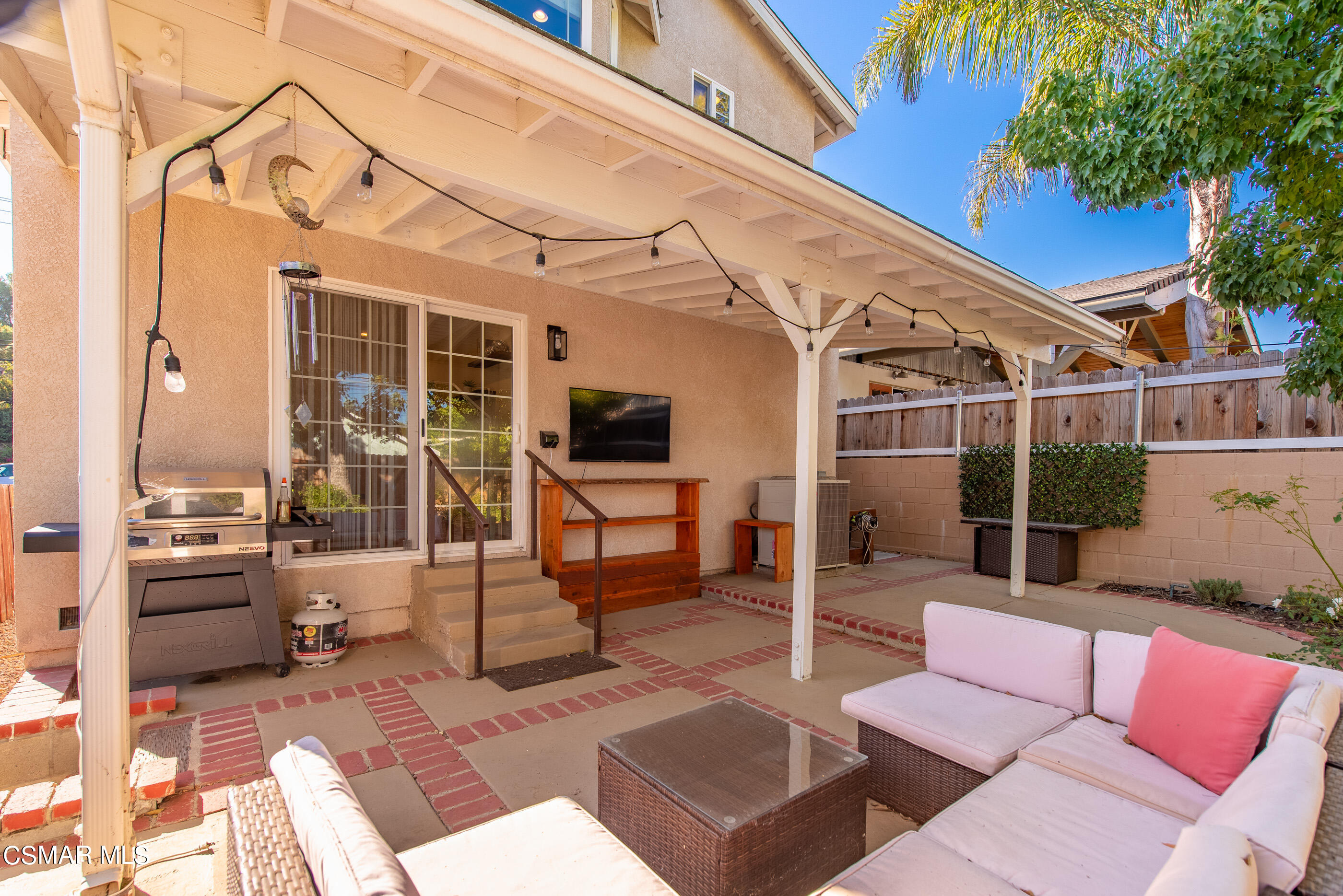 608 Hodencamp Road Thousand Oaks, CA 91360 - Photo 22 of 24 a view of a patio with couches table and chairs and potted plants