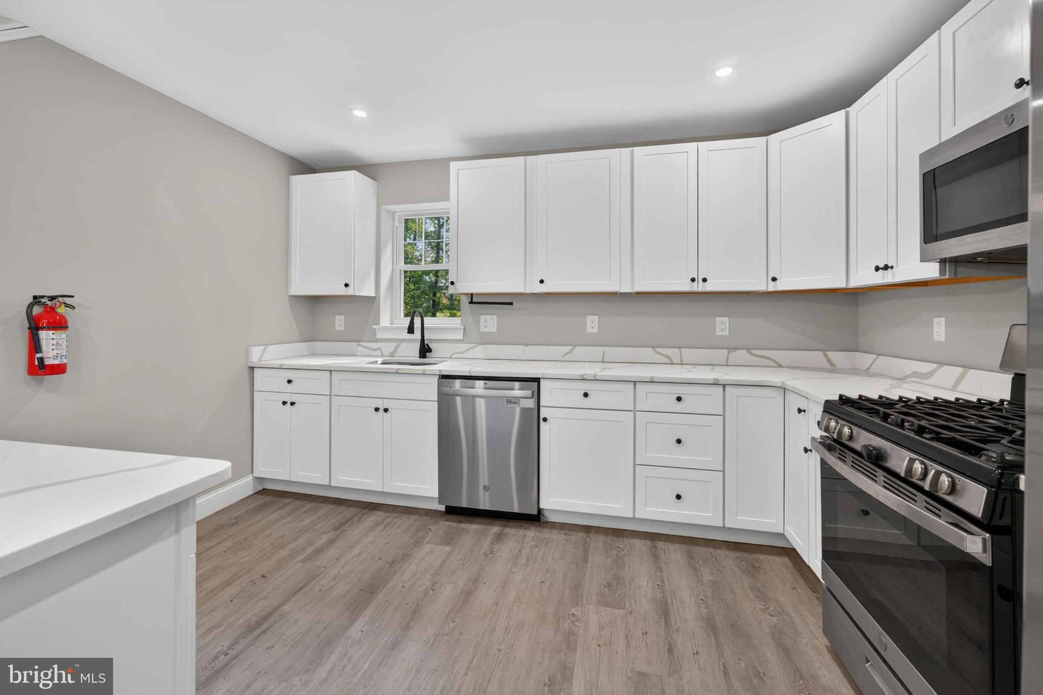 62 Higgins Avenue Clementon, NJ 08021 - Photo 8 of 20 Stainless steel & lots of cabinets